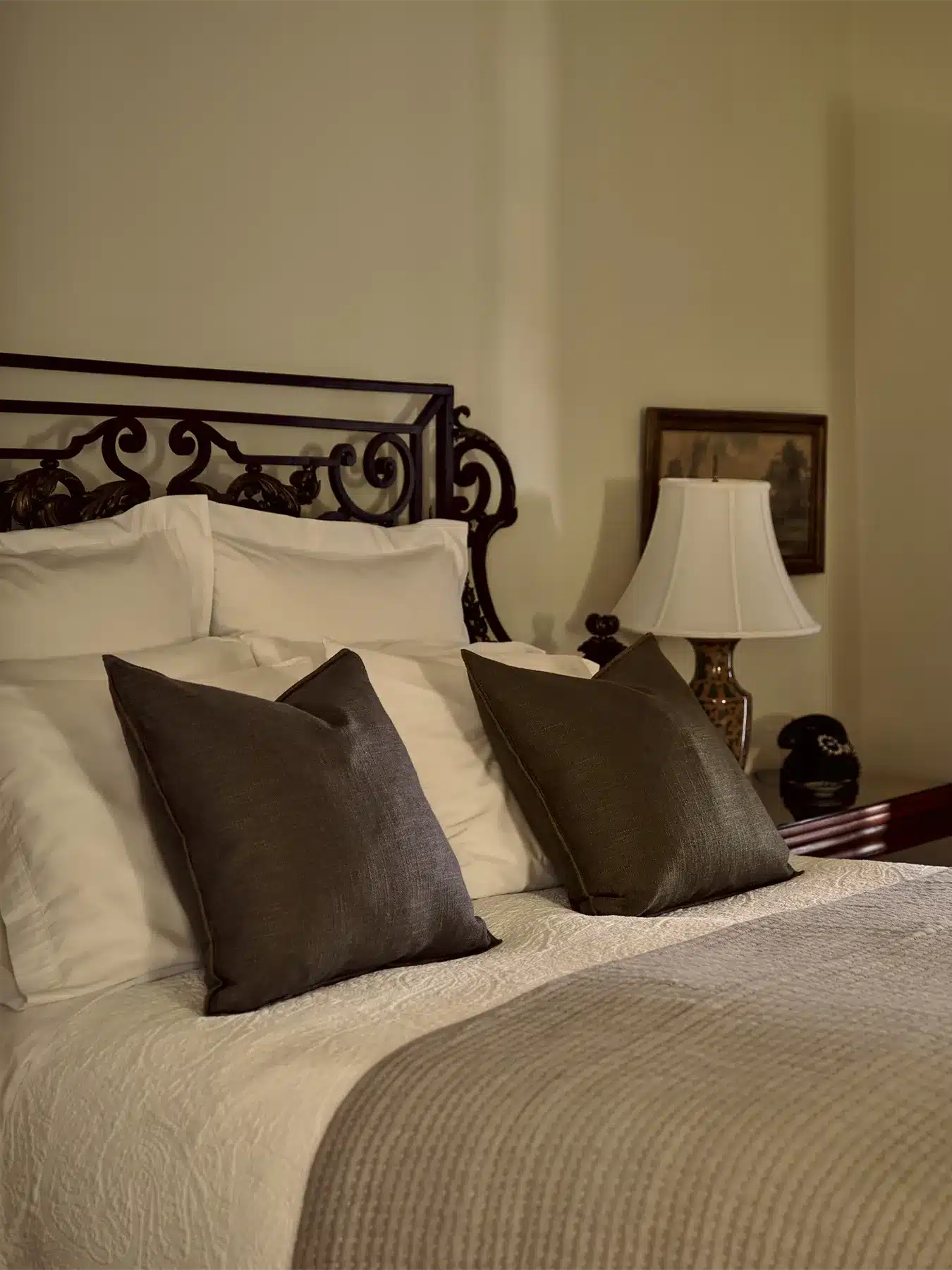 Acanthus bed with side table and lamp