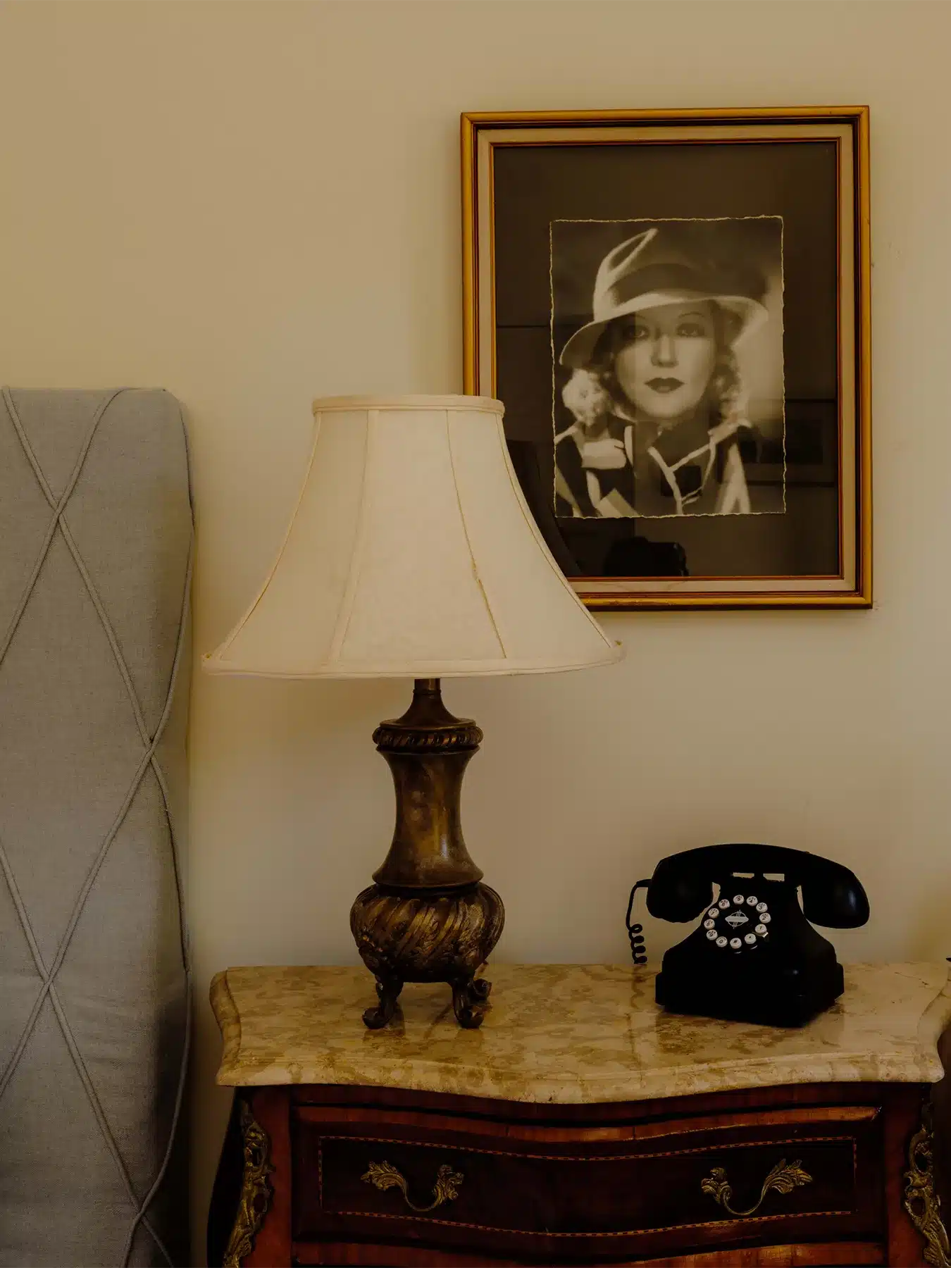 Orchid Tree side table with phone and lamp