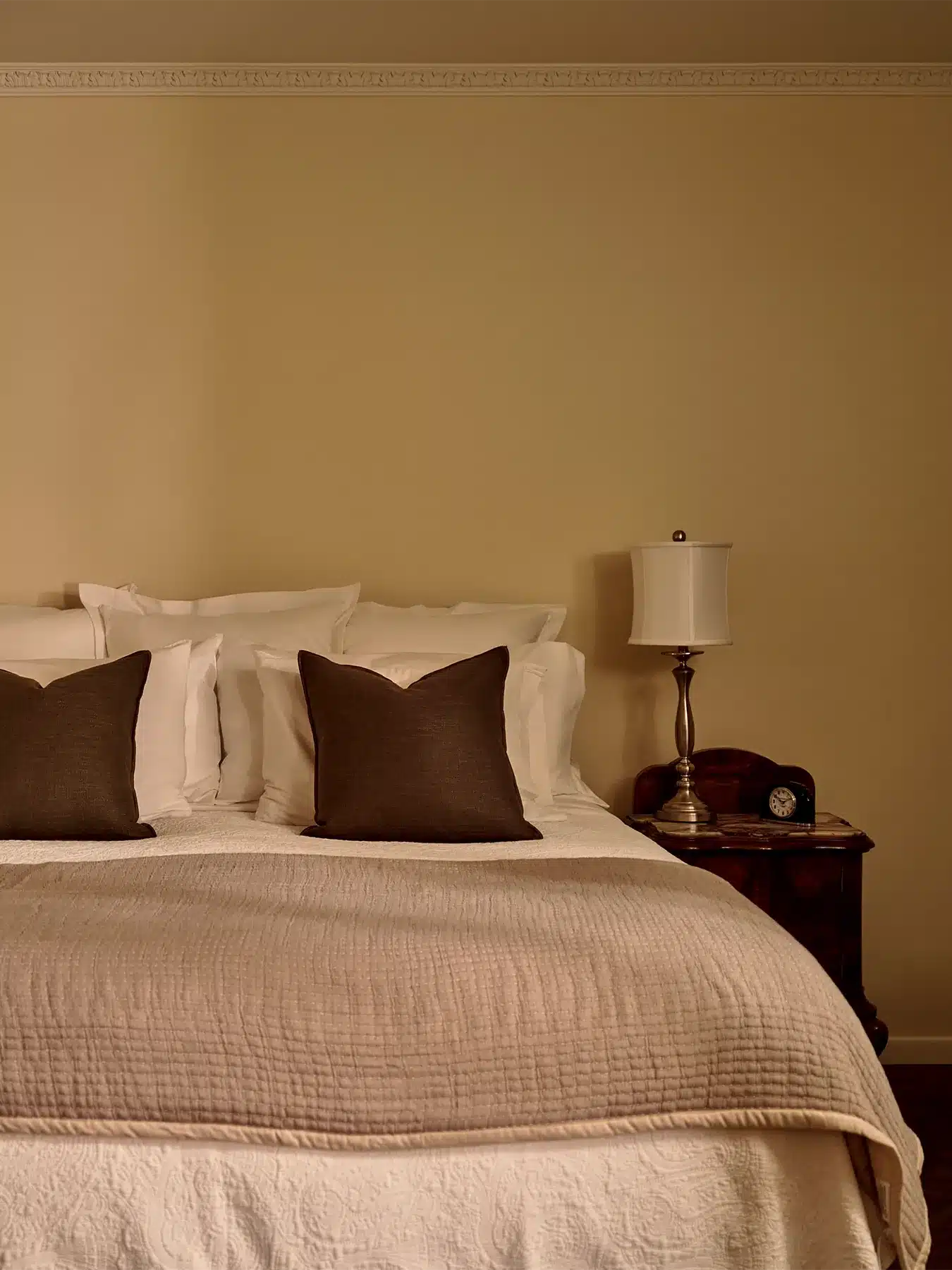 Rock bed with side table and lamp