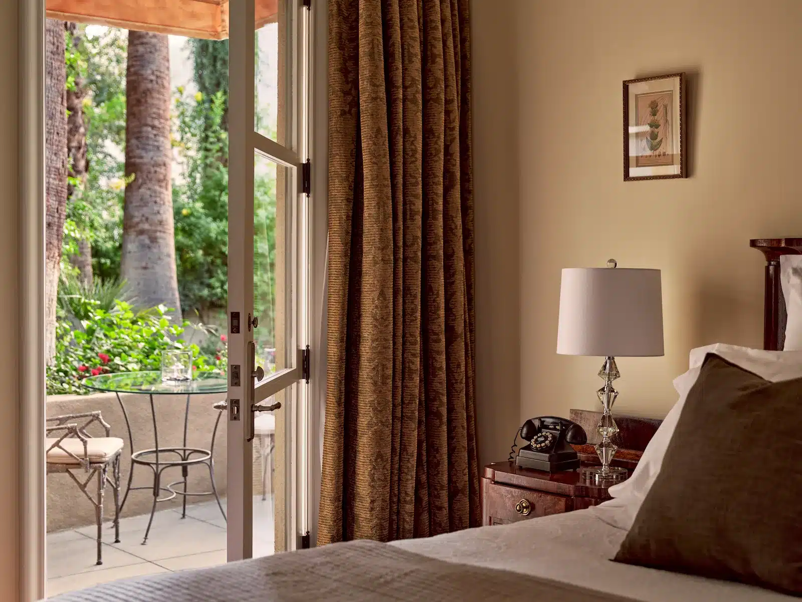 Einstein bed with patio door open leading to patio