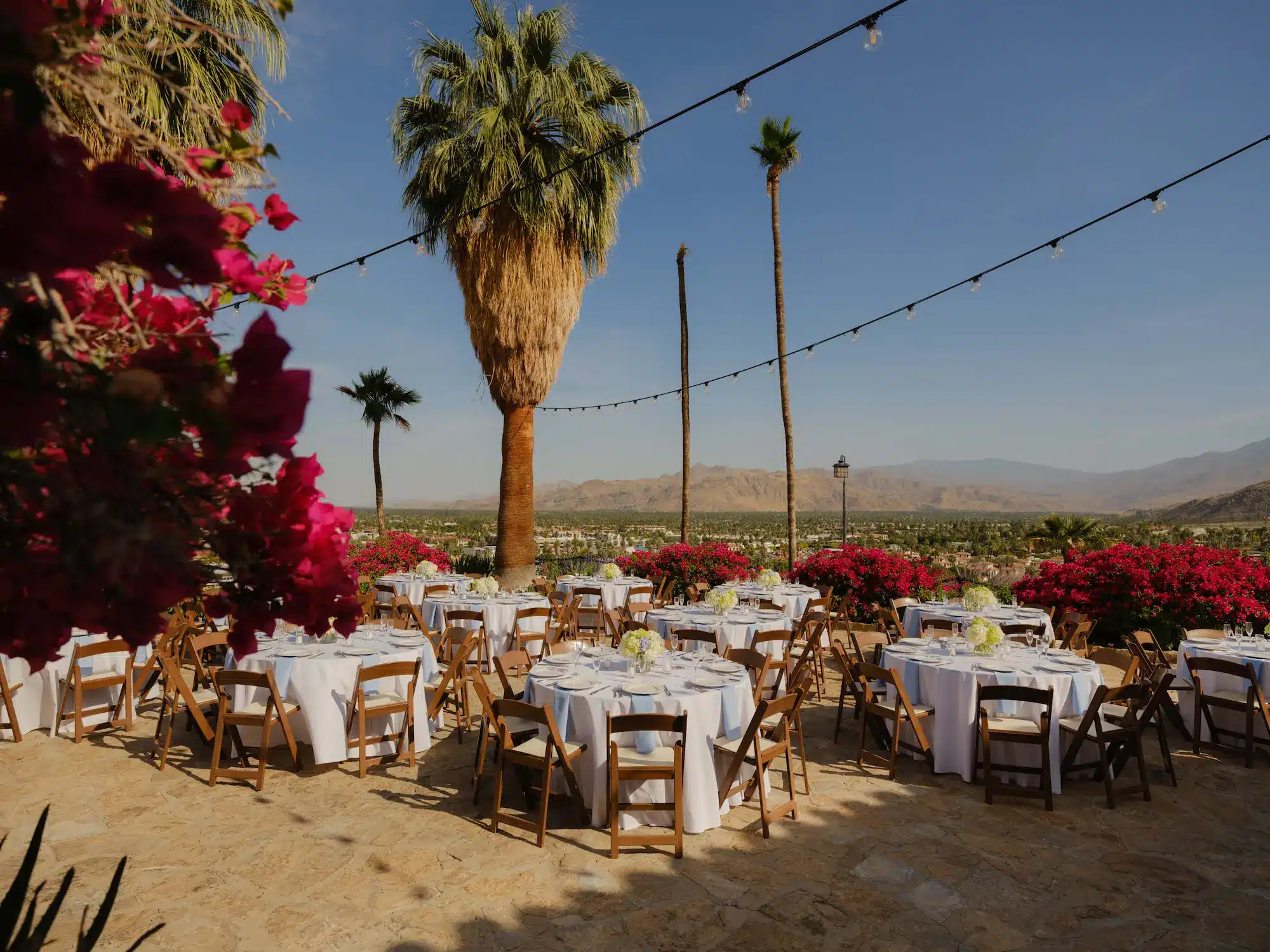 Events and weddings 4 Outdoor wedding event with dining tables overlooking hillside